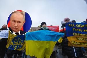 A photo shows Ukrainian activists with flags and banners urging for the return of Ukrainian soldiers from Russian captivity on December 10, 2023 in Kyiv, Ukraine, alongside a picture of Russian president, Vladimir Putin